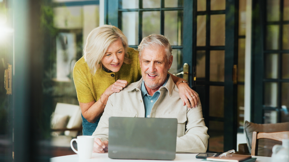 Laptop, planning and smile with old couple in home for retirement fund, profit and budget. Online banking, savings account bonus and pension review with senior man and woman in house for audit for best retirement accounts.