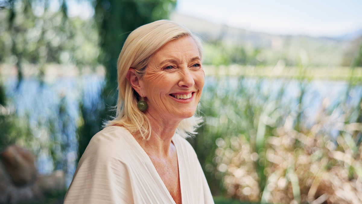 Break, smile and thinking with woman outdoor at lake for experience, travel or weekend getaway. Ideas, relax and wellness with happy mature person in nature environment for holiday, trip or vacation Little Things That Can Add Up to Big Savings.