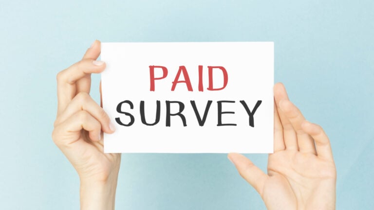 Paid survey text concept isolated over white background.