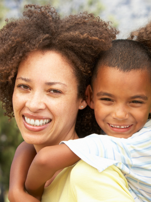 Portrait of Happy Family In Park