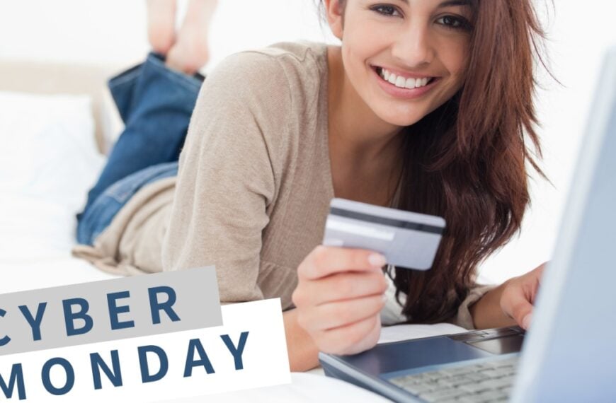 Digital composite of Cyber Monday Sale Woman lying in front of laptop with creditcard in her hand.