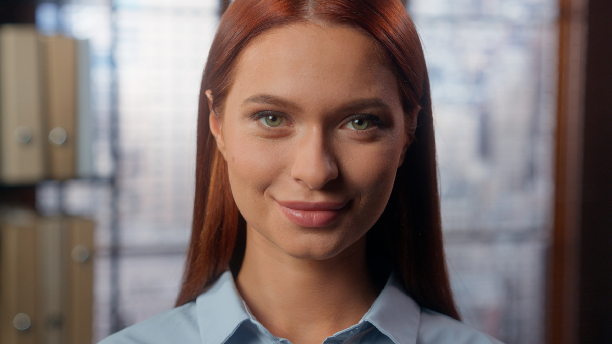 Portrait in company office beautiful smiling confident student girl business woman headshot looking at camera businesswoman female lady employer corporate worker marketing manager specialist face.