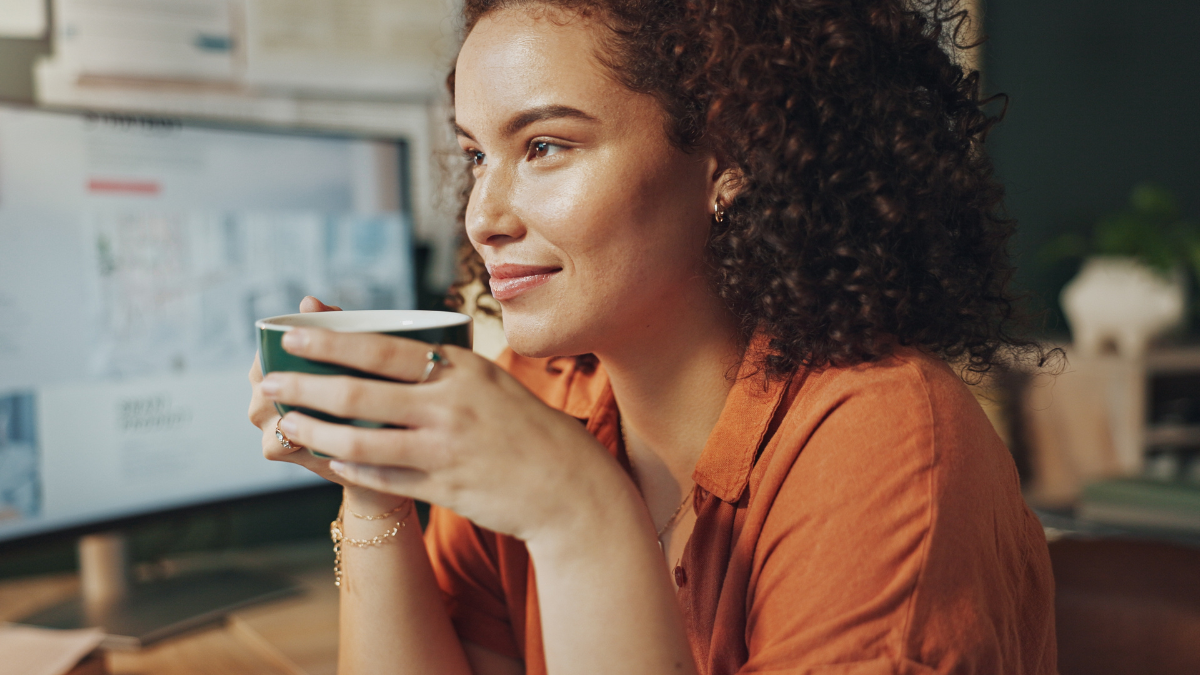 Business woman, coffee and thinking in home office for research, hybrid work and positive mood. Virtual assistant, vision and cup of tea for project, pride and professional administration support work from home jobs.