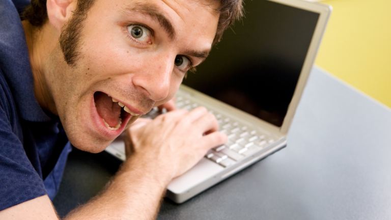 person hacking a computer