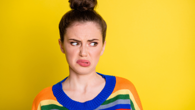 Photo of young girl disgusted dislike bad smell negative