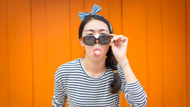 New Remove BG Save Share Sample New Girl posing against colorful wooden backdrop to show lifestyle creep.