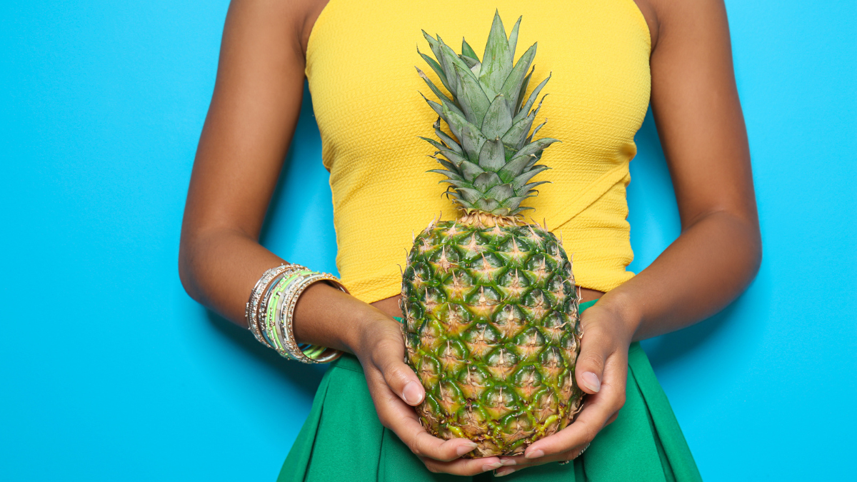 New Remove BG Save Share Sample New Beautiful African-American woman with pineapple.