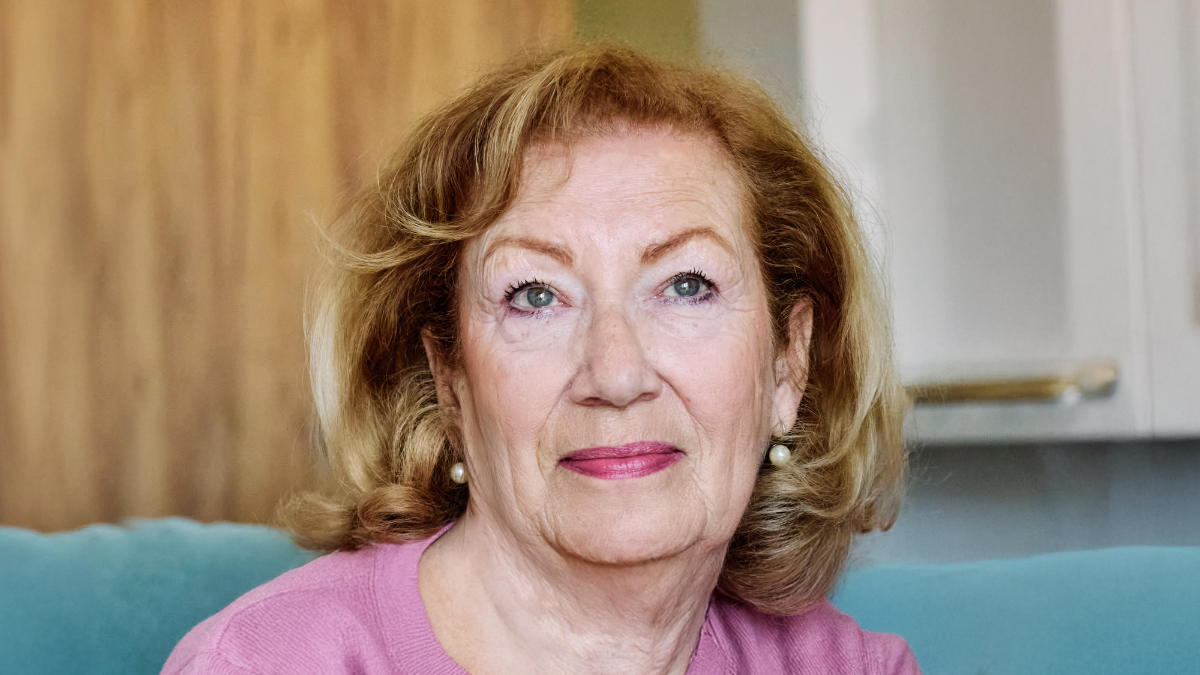 Portrait of a frustrated angry sad senior elderly woman at home.