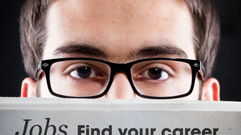 Career News. Young adult looking for daily news.