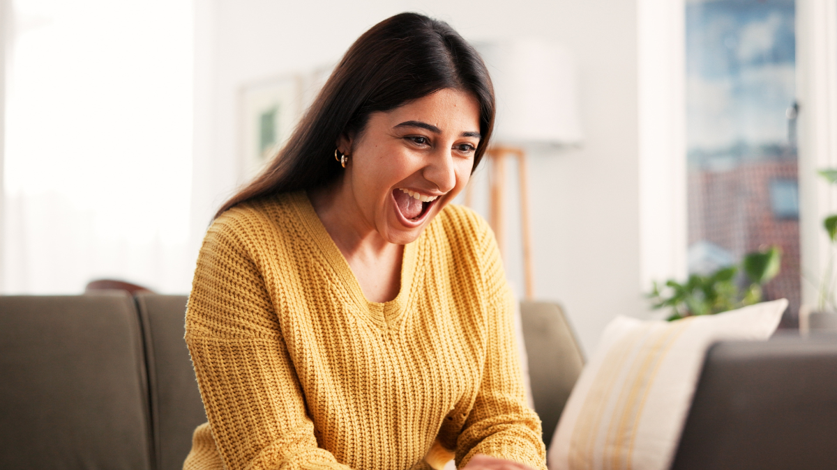 Excited, woman and remote work with laptop at house for good news, success and lotto winner. Surprise, female person and email for job promotion, bonus achievement and announcement of employee award Side Jobs You Can Do From Home.