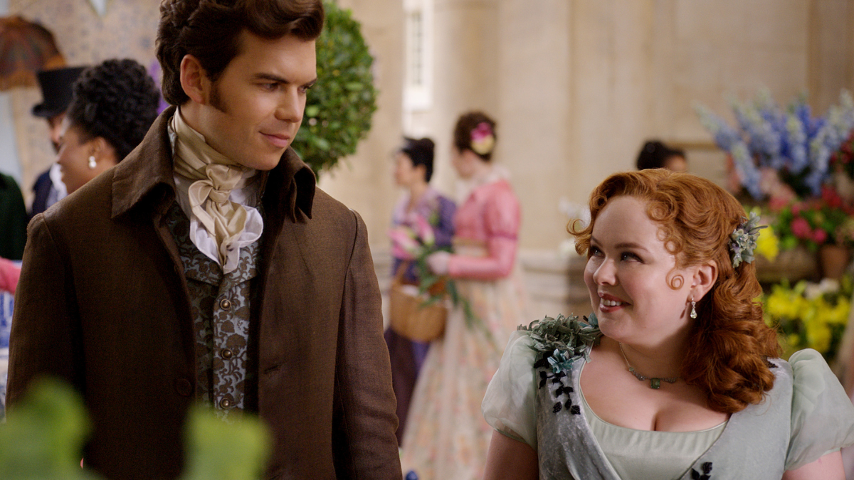 Bridgerton. (L to R) Luke Newton as Colin Bridgerton, Nicola Coughlan as Penelope Featherington in episode 10 of Bridgerton.