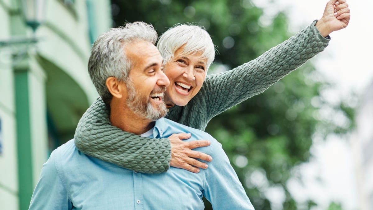 Happy active senior couple outdoors.