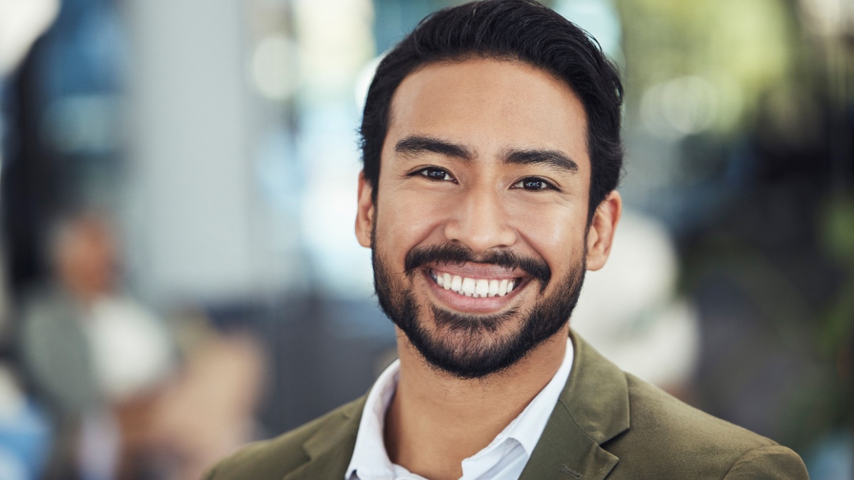 Business man, face and smile in portrait with success, professional mission and mindset outdoor in city.