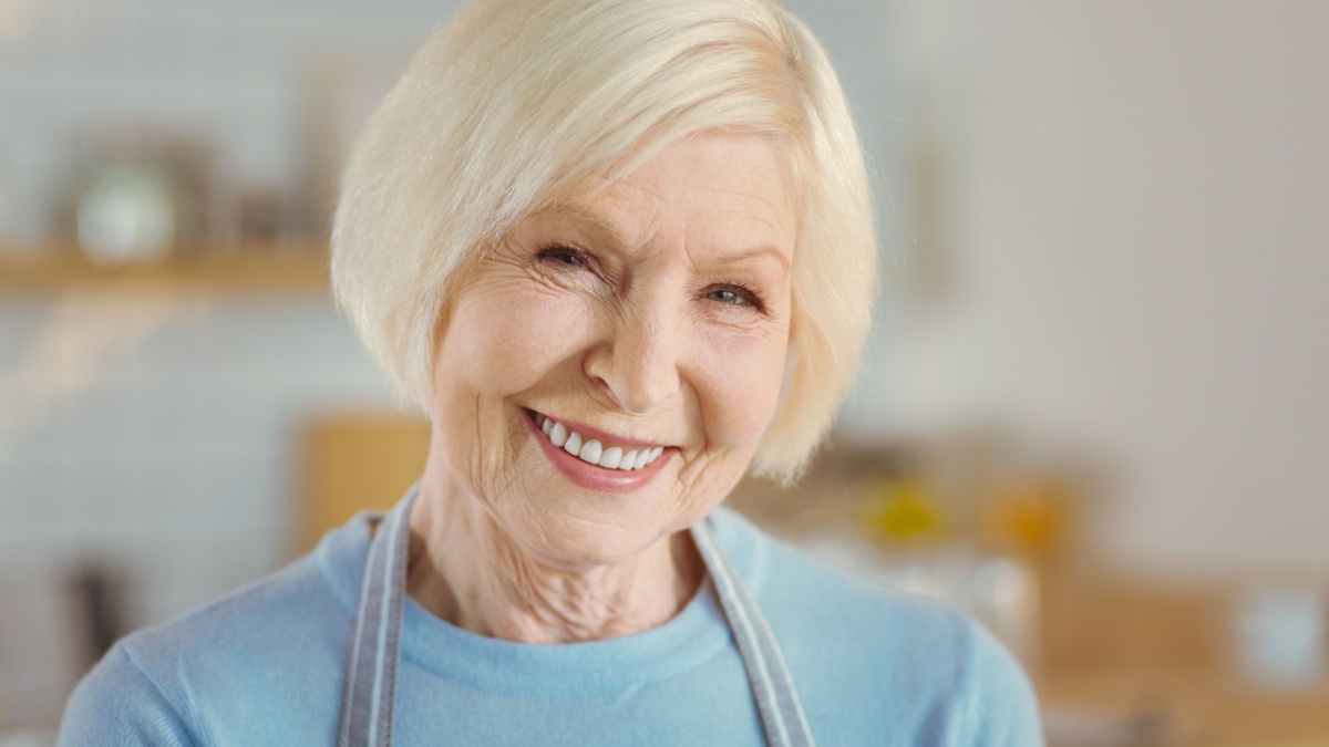 Portrait of a delighted aged woman.