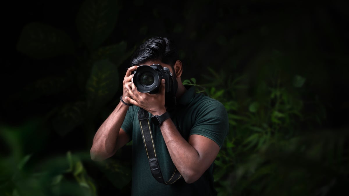 High quality photo of photographer taking picture of nature.