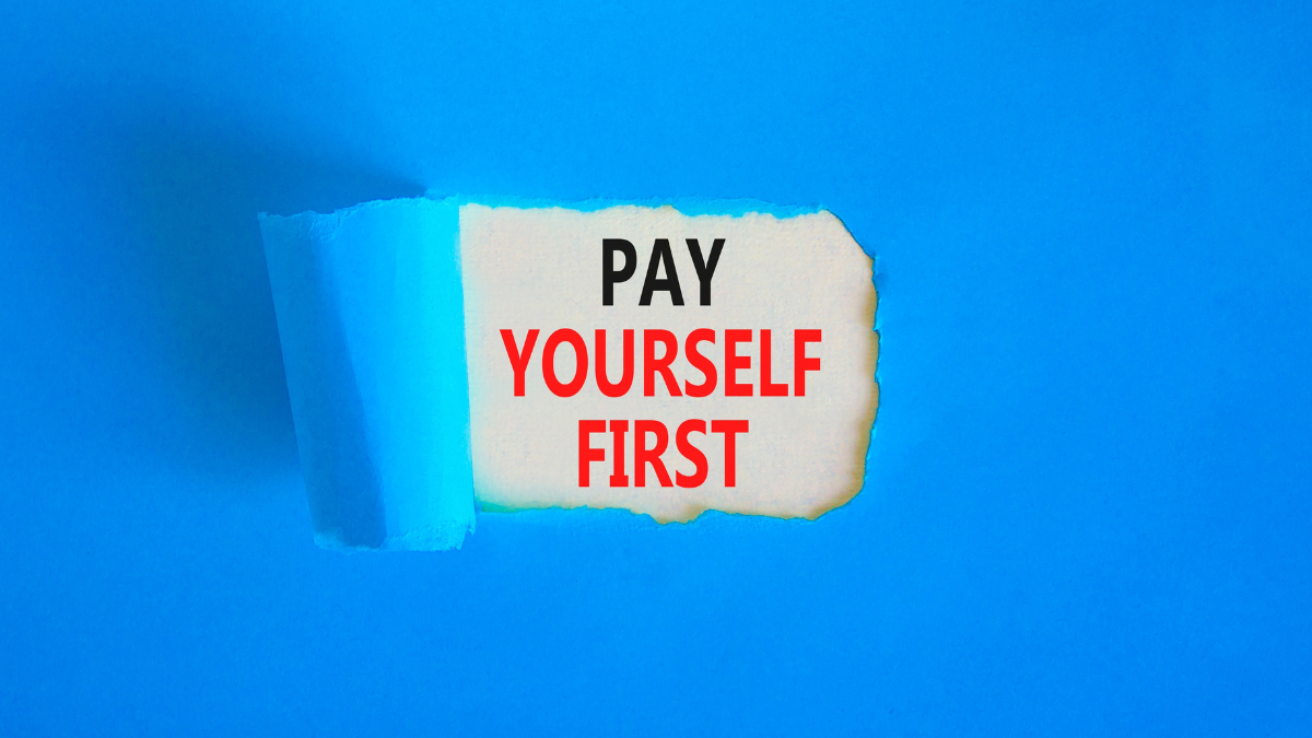 Pay yourself first symbol. Concept words Pay yourself first on beautiful white paper. Beautiful blue paper background. Business and pay yourself first concept. Copy space.