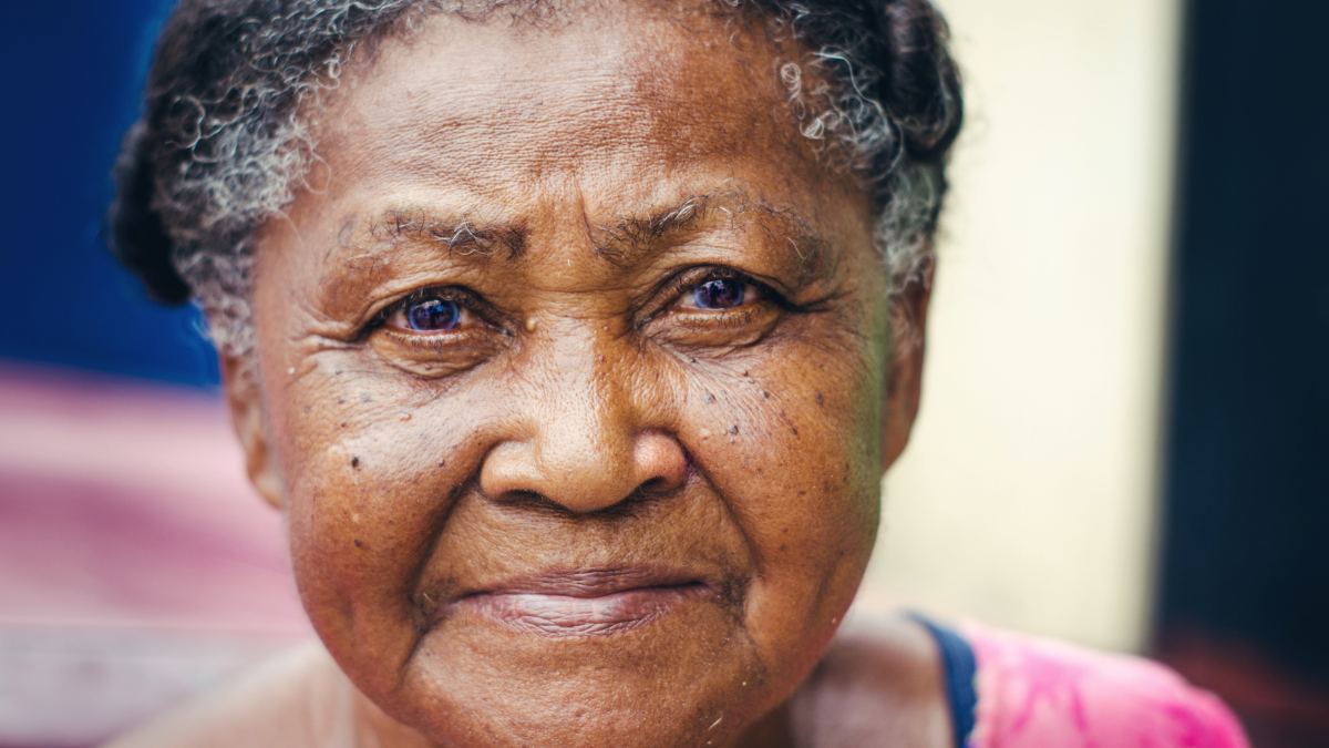 portrait of an elderly woman with beautiful look of Dominican Latin origin looking at the camera .