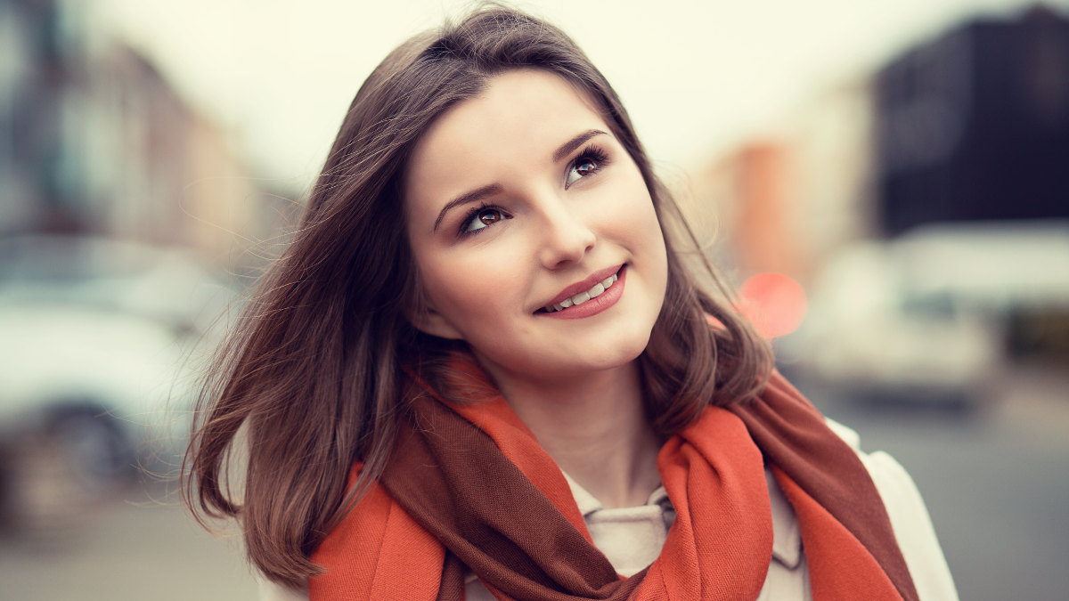 Woman happy. Closeup portrait headshot of beautiful smiling toothy sunshine girl student cityscape outdoor background. Multicultural, mixt race, asian russian model. Happiness freedom success concept.