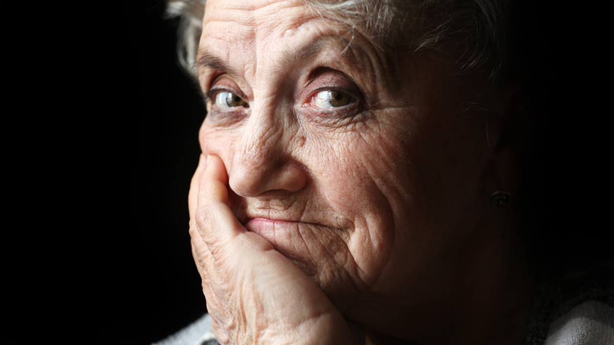 Grandmother face on a black.