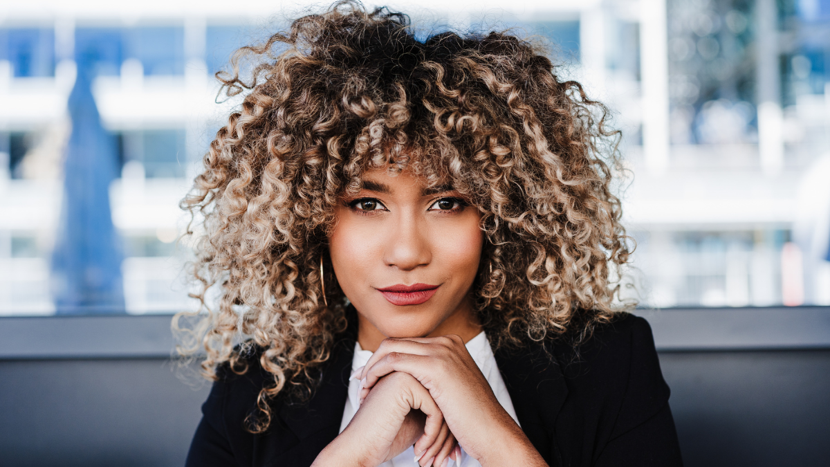 portrait of serious confident business woman in cafe. Business concept.