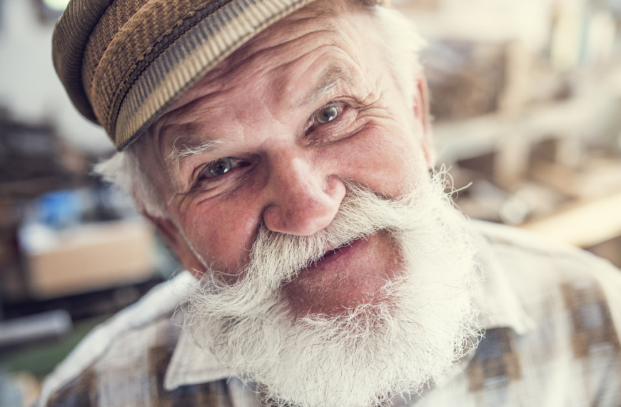 Closeup of a senior craftsman in his workshop.