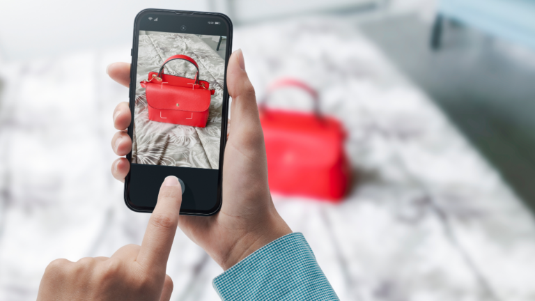 Woman taking a picture of her bag using her smartphone, she wants to sell her fashion accessories online, POV shot.