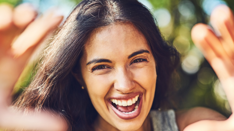 Its a gorgeous day out. Portrait of an attractive young woman spending the day outdoors.