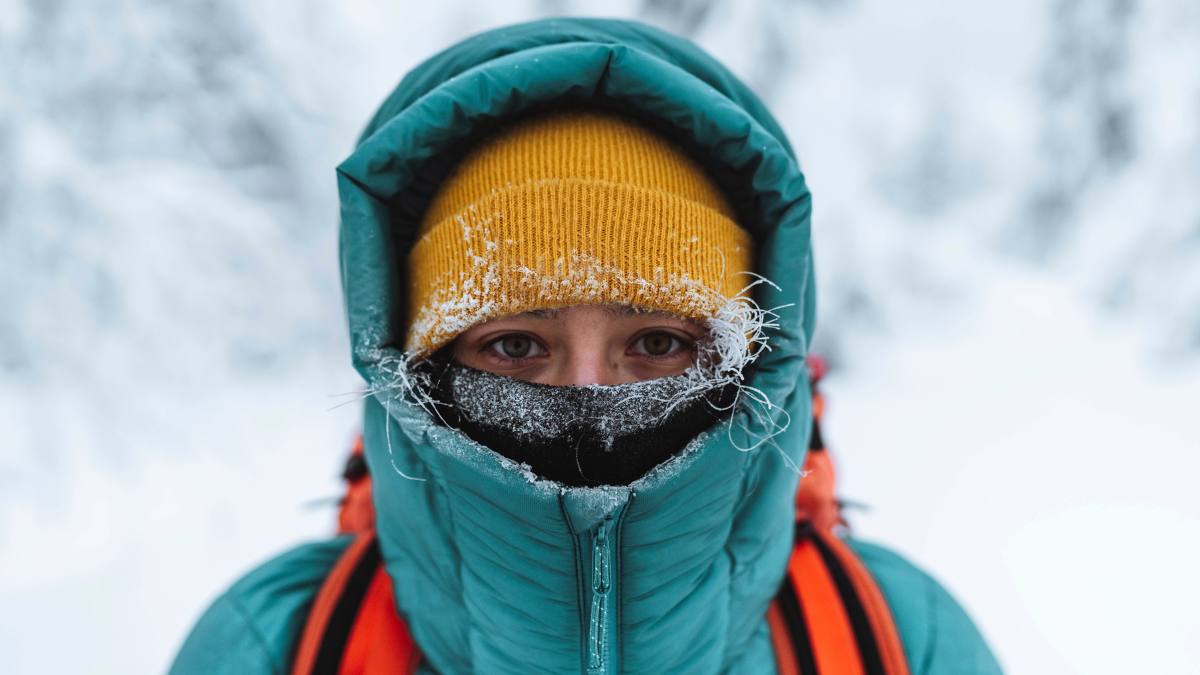 Female mountaineer in wintertime at Glen Coe, Scotland.
