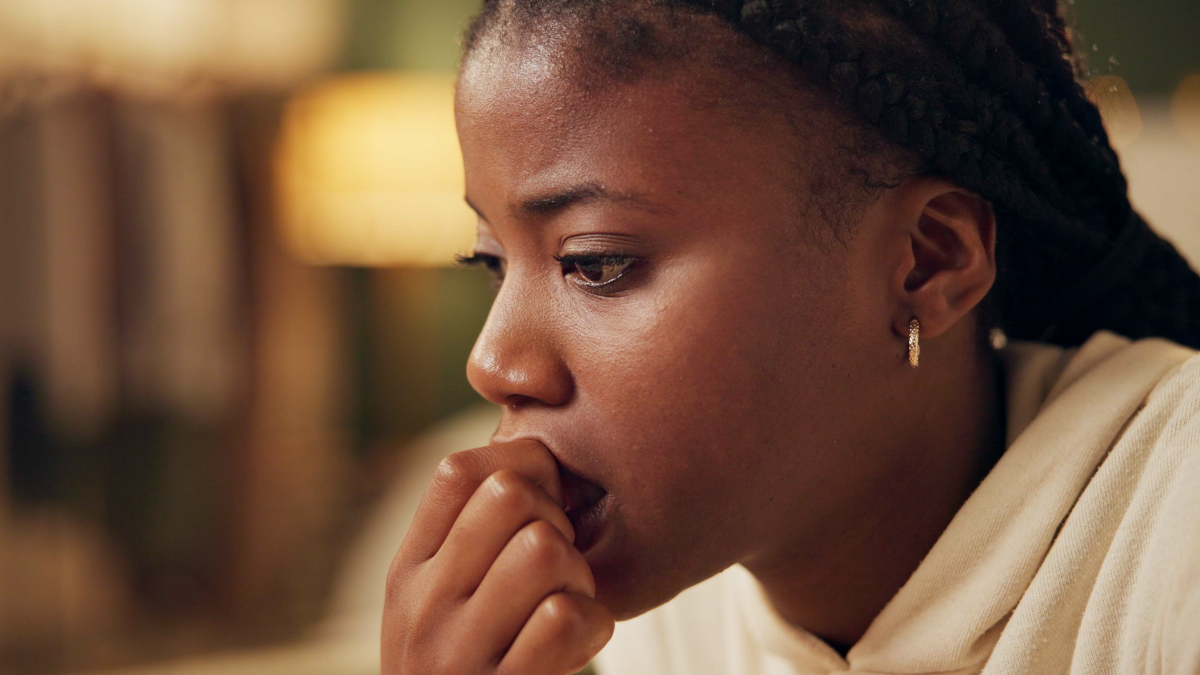 Anxiety, thinking and black woman in home with stress from financial loan, student debt and crisis. College, finance and girl with worry about problem, fear and coping with conflict in mental health.