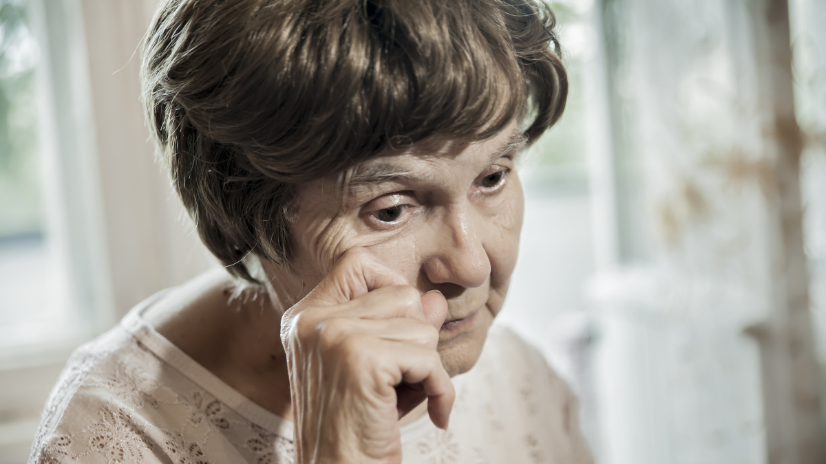 the old woman crying.