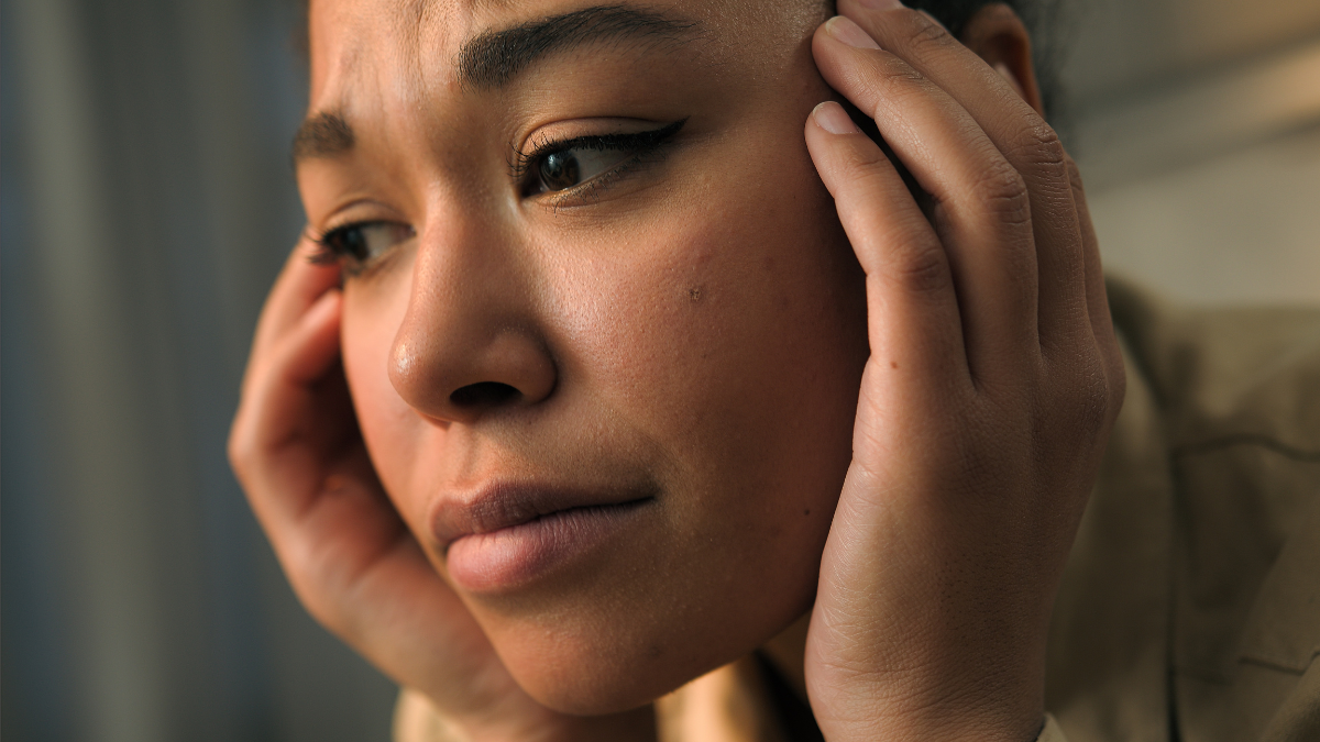 How Much Money Should You Have in an Emergency Fund? woman stressed.