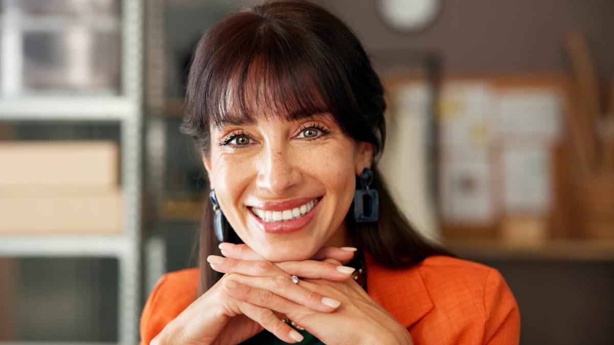 smile with business woman.The 4 Golden Rules of Money Everyone Should Follow.